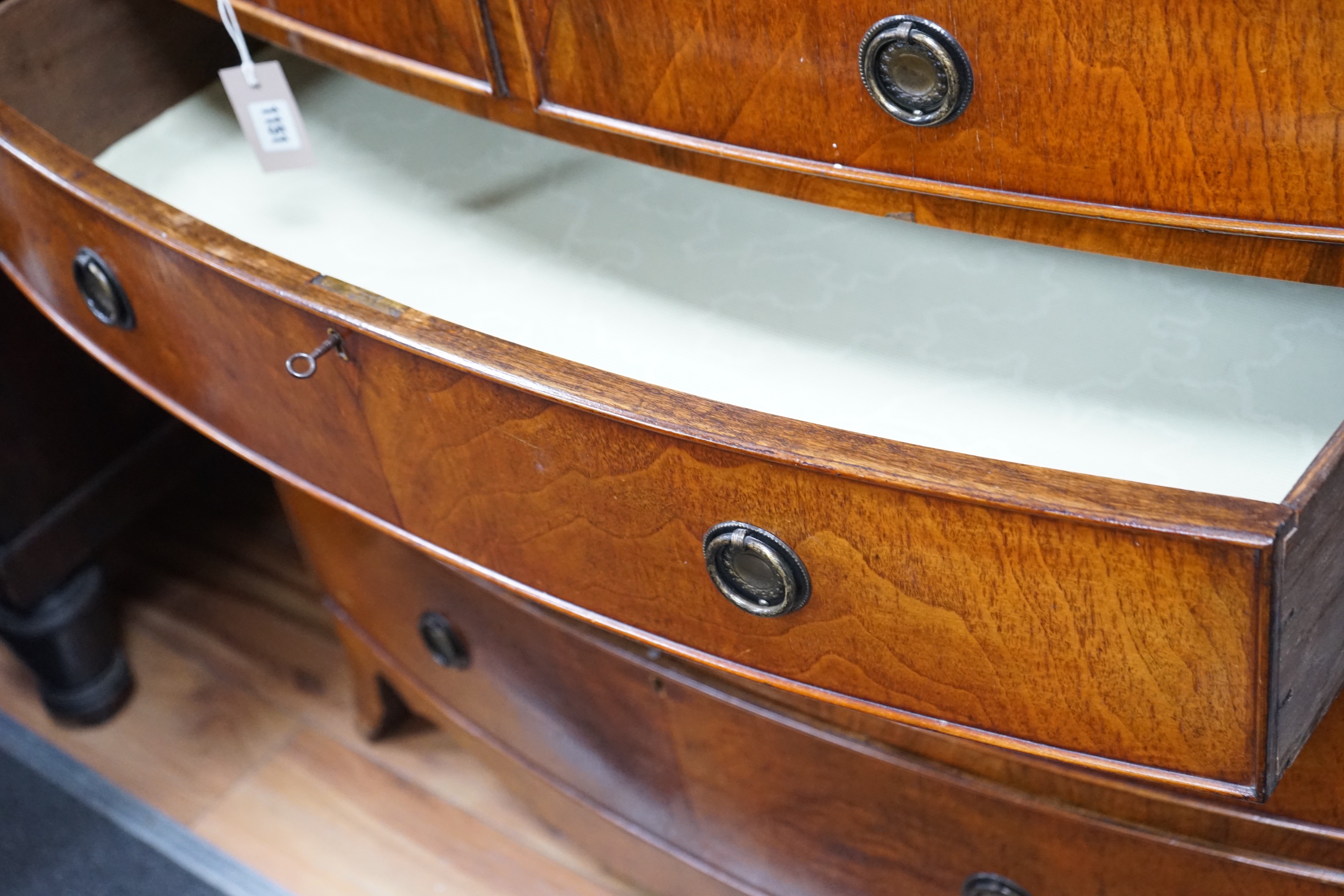 A Regency mahogany bowfront chest of two short and three long drawers, width 91cm, depth 50cm, height 92cm